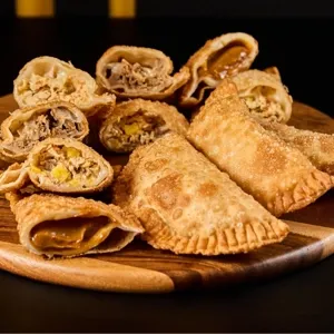Golden stuffed Colombian empanadas made fresh at Monchy's