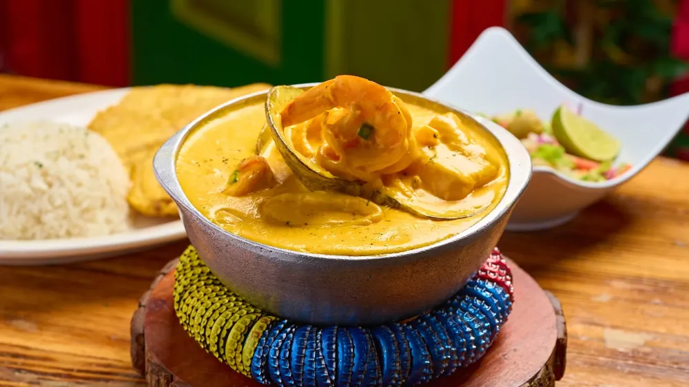 Cazuela de mariscos served in a traditional pot