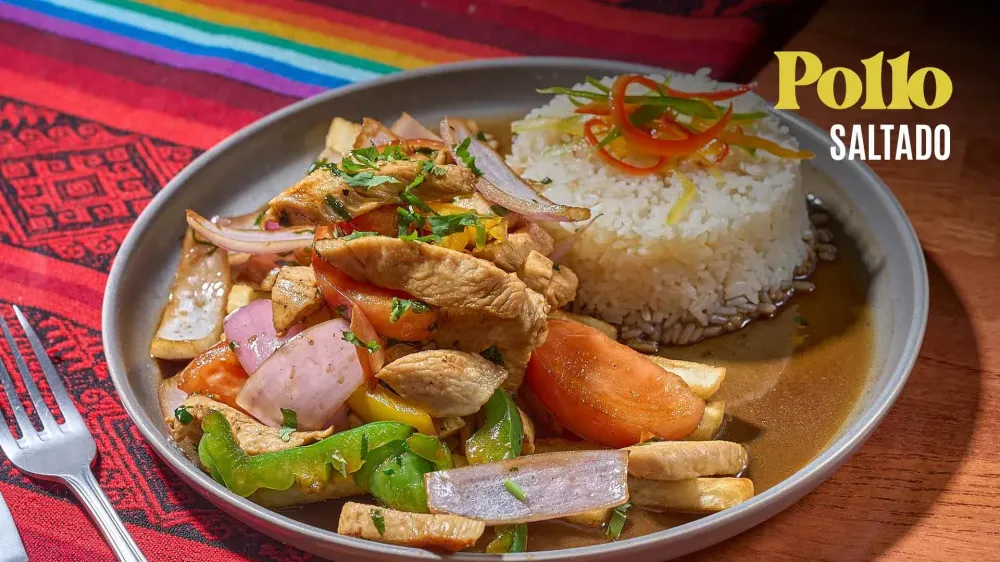 Pollo saltado with rice