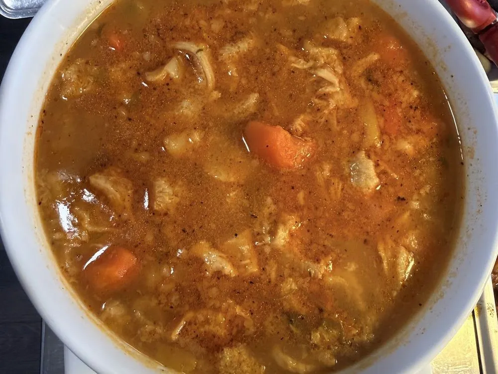 Homemade soup with lime on the side