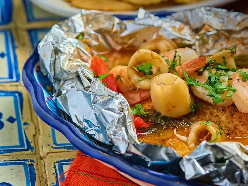 Tilapia El Maguey with seafood