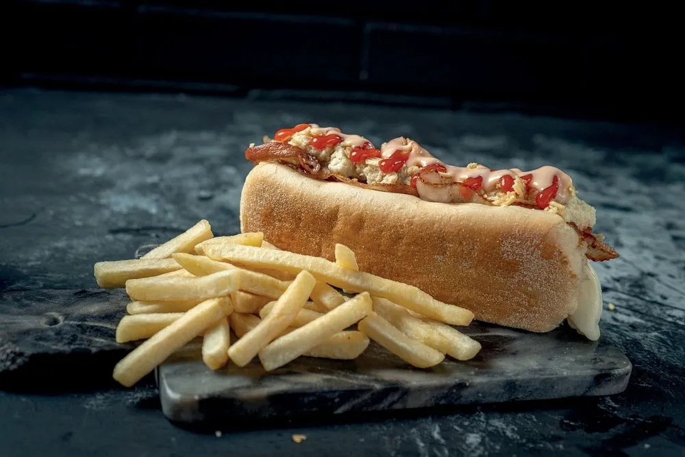 Loaded hot dog with french fries