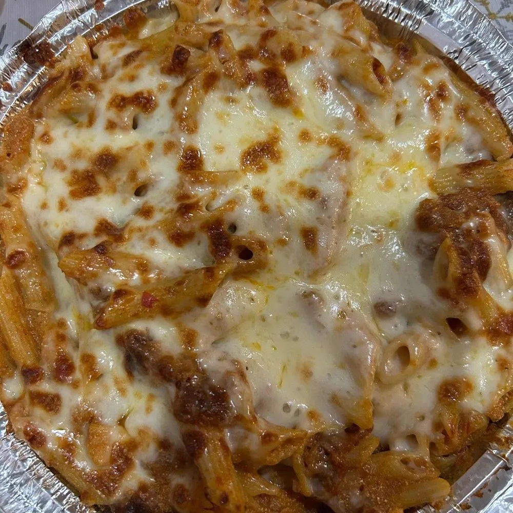 Baked ziti with marinara, ricotta and melted mozzarella